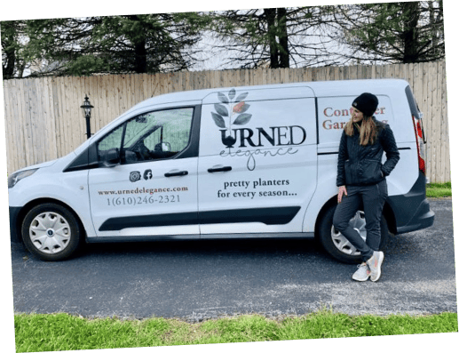 Gina Khalifa standing in from of Urned Elegance van